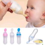 Silicon Baby Food feeder bottle rice cereal with soft squeeze spoon - Multicolor